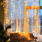 Curtain lamp with remote control and movable light for a warm, safe atmosphere at home