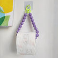 Innovative hanging toilet paper holder with beads