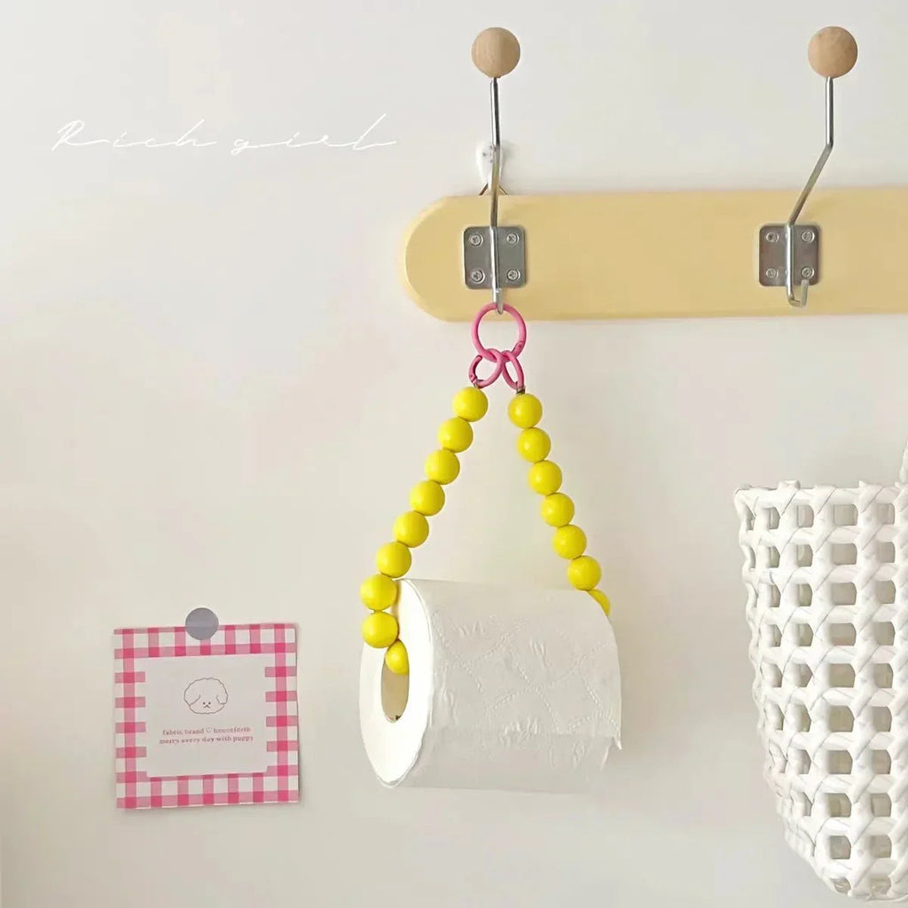 Innovative hanging toilet paper holder with beads