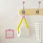 Innovative hanging toilet paper holder with beads