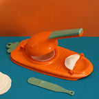 Dumpling mold with lever mechanism for quick and even dough pockets