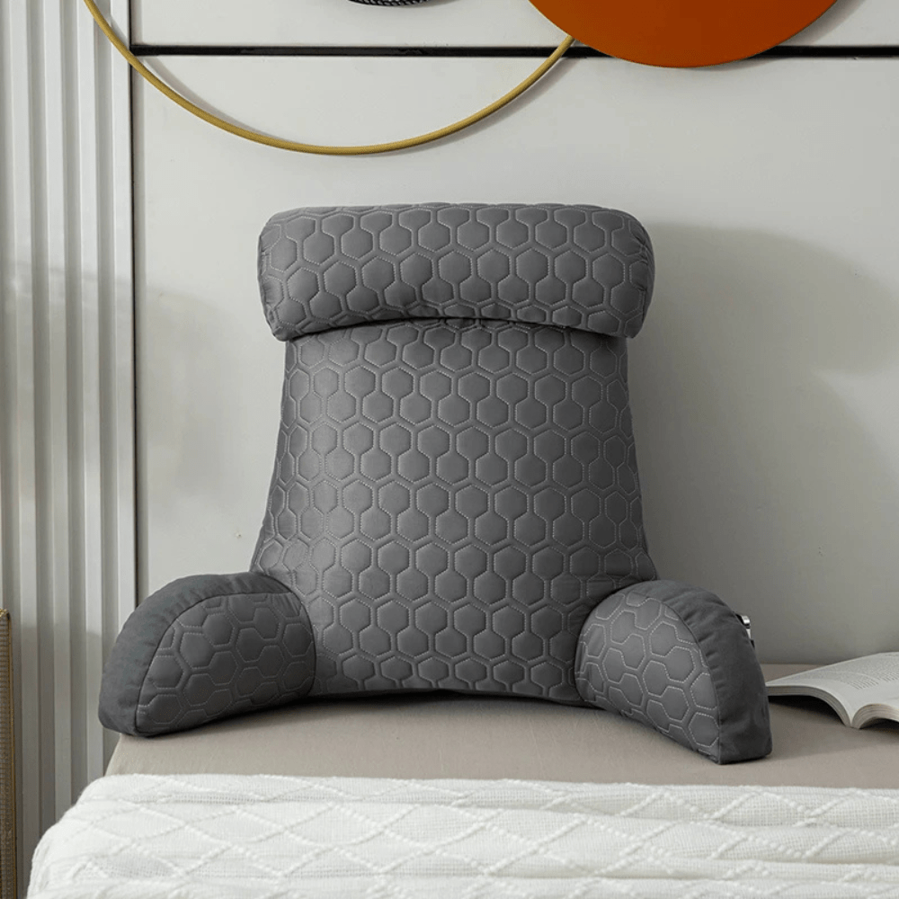 Reading pillow for the bed with armrests
