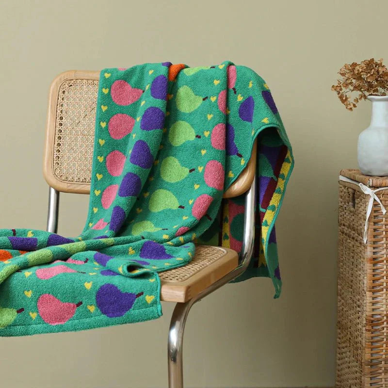 Soft children's towel made of cotton with pear motif