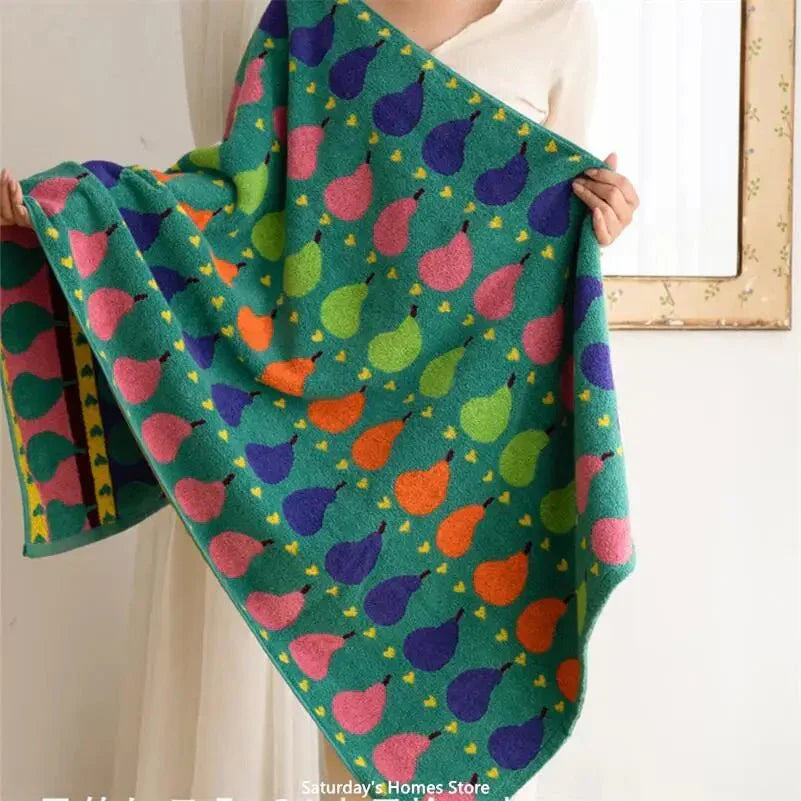 Soft children's towel made of cotton with pear motif