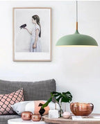 Pendant lights made of metal and wood in delicate pastel shades