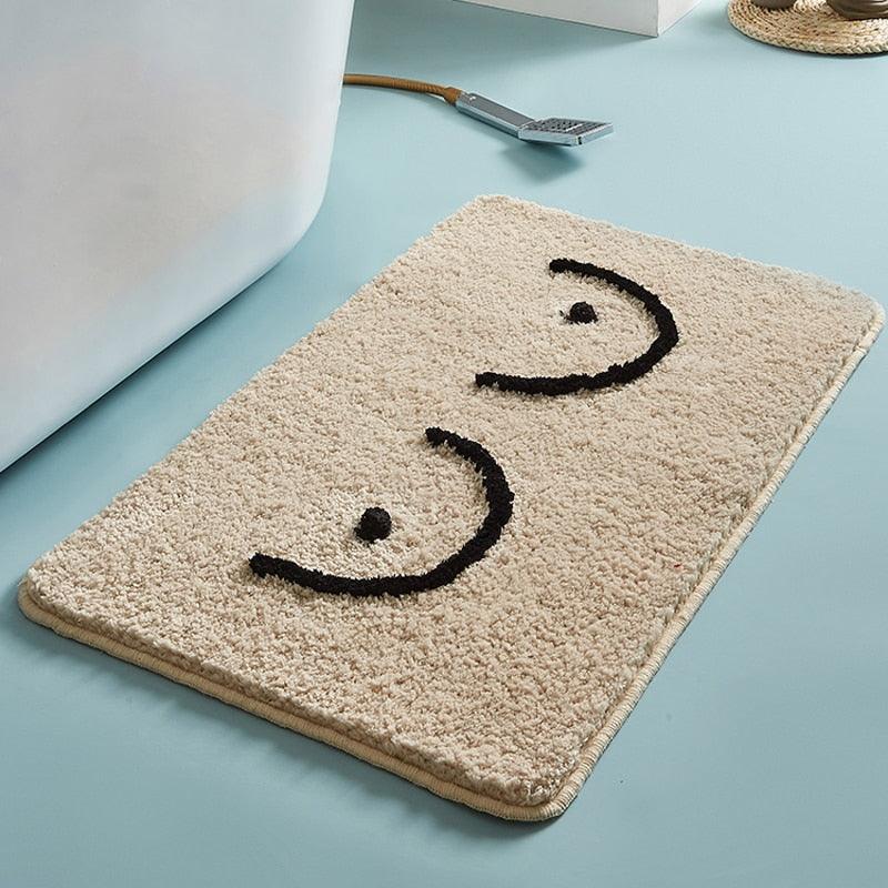 Bath mat with tits