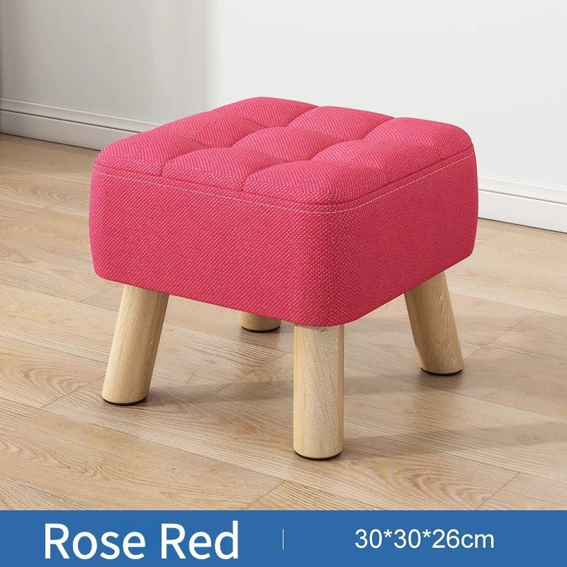 Padded ottoman stool in retro style in pastel colors