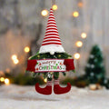 Santa Gnome with Christmas Wreath and Sparkling LED Lights – Perfect for Front Door, Wall, or Window Festive Magic