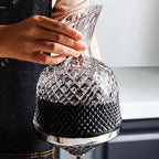 Rotating Crystal Decanter at a High Level