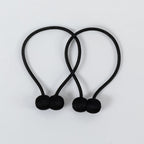 Curtain tiebacks with magnetic curtain clasp