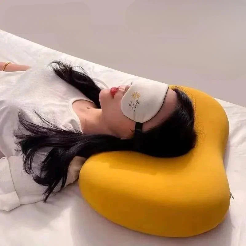 Ergonomic pillow with soft, colorful shape for comfort and relaxation