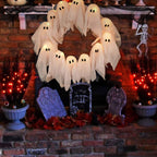 SPOOKGLOW – LED Ghost Wreath with 12 Illuminated Spirits