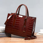 Bag with crocodile embossing.