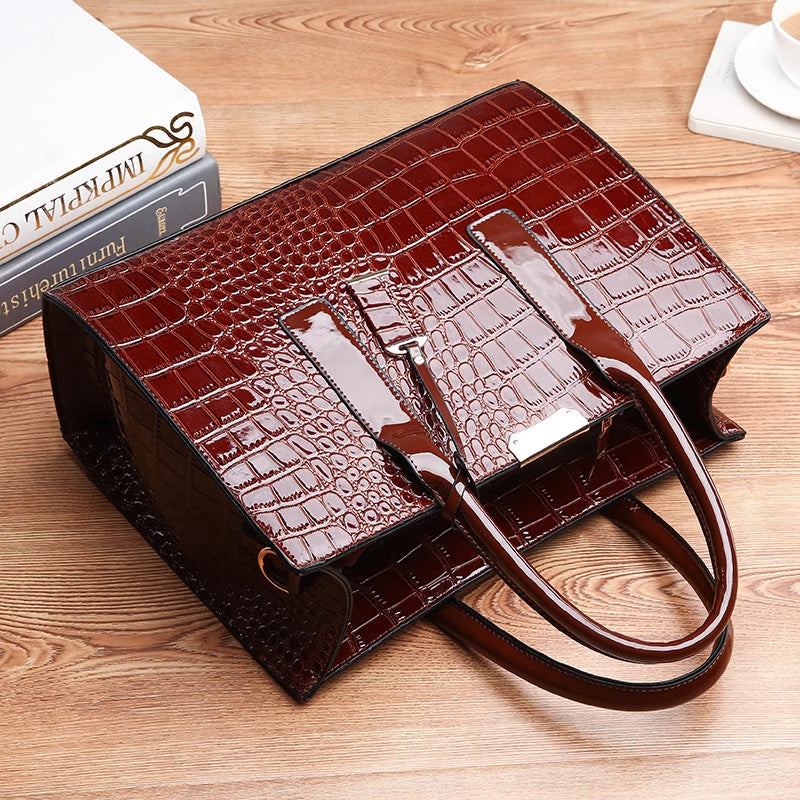 Bag with crocodile embossing.
