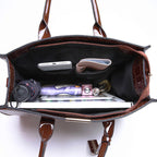 Bag with crocodile embossing.