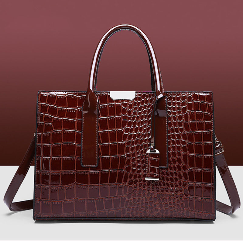 Bag with crocodile embossing.