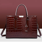 Bag with crocodile embossing.