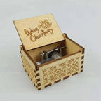 Vintage mechanical music box with hand crank