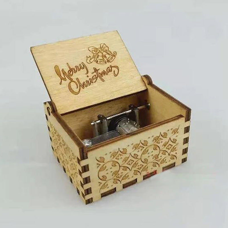 Vintage mechanical music box with hand crank