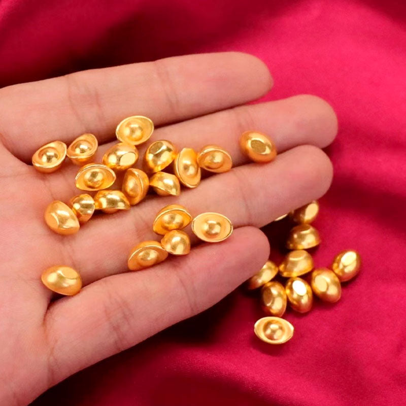 Small gold nugget-shaped ornaments