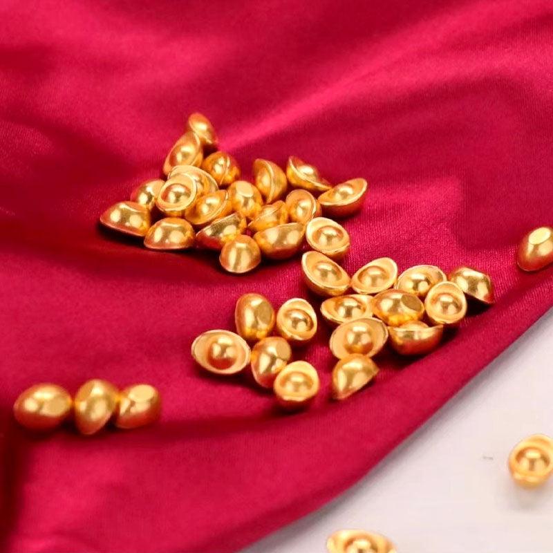 Small gold nugget-shaped ornaments