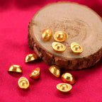 Small gold nugget-shaped ornaments