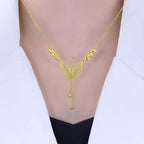 Necklace with gold-colored butterfly with tassels