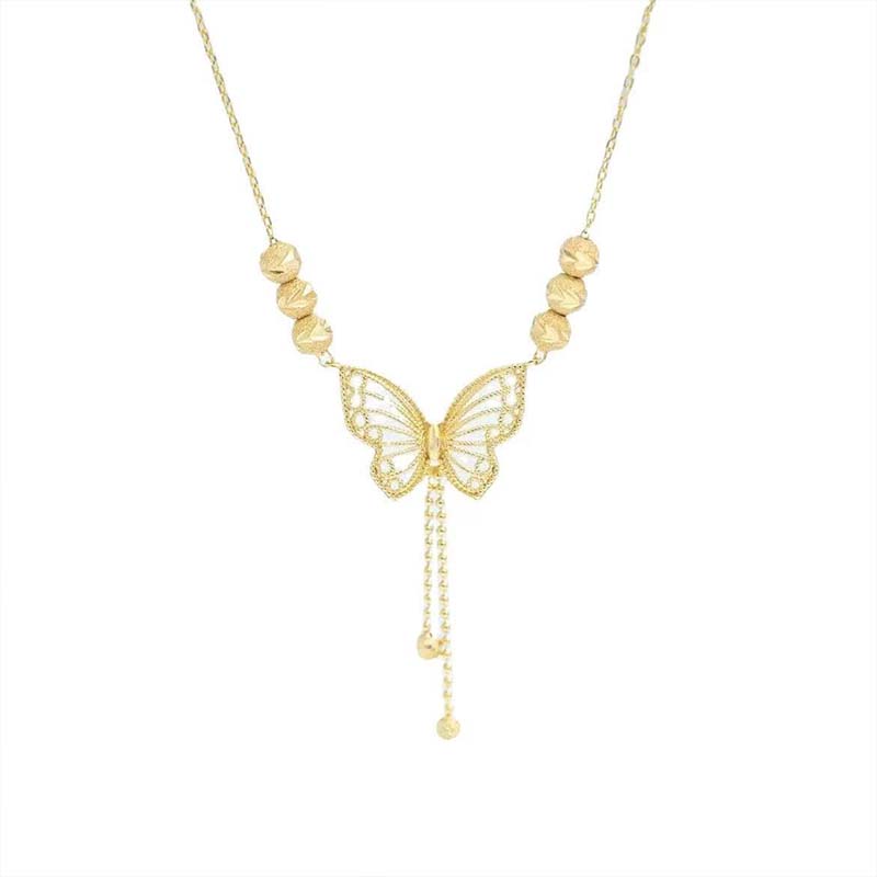 Necklace with gold-colored butterfly with tassels
