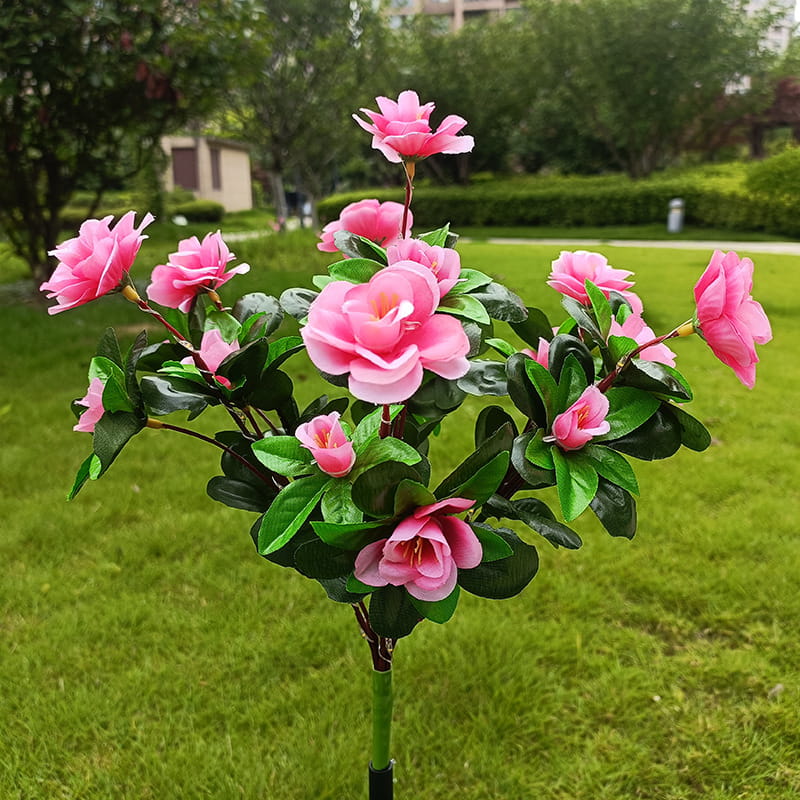 Solar lamp with simulated azalea flower and ground stake