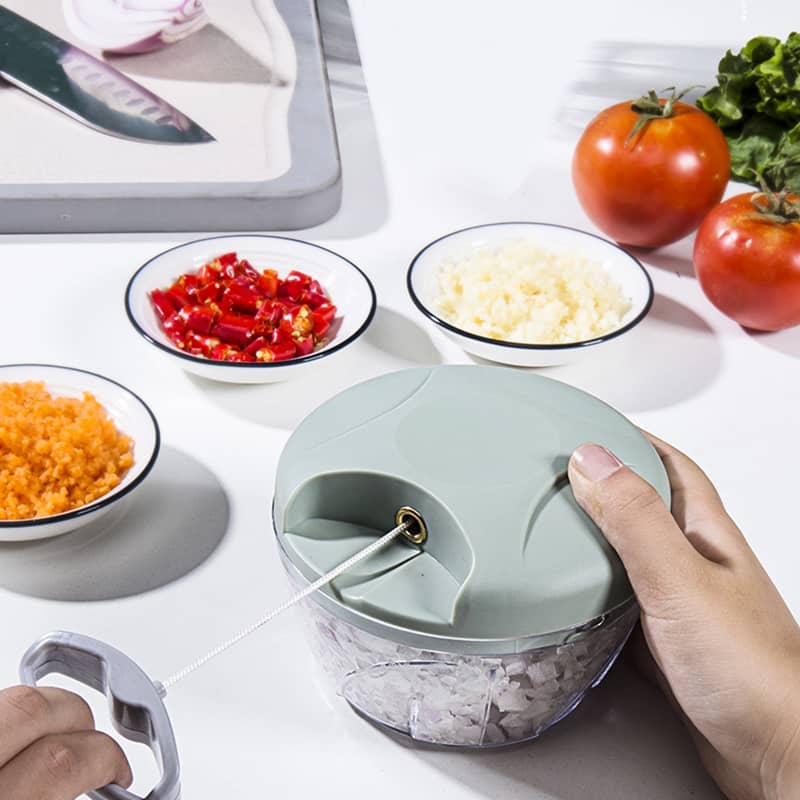 Handheld vegetable cutter for household use