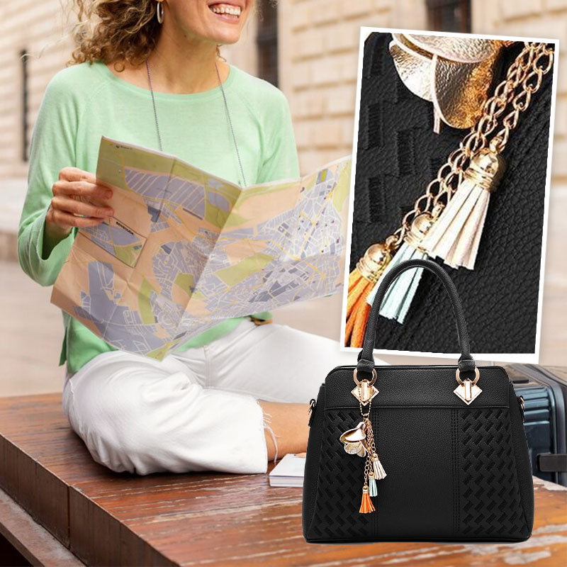 Elegant women's bag with tassel pendant