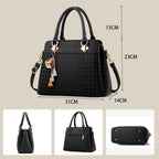 Elegant women's bag with tassel pendant