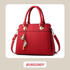 Elegant women's bag with tassel pendant