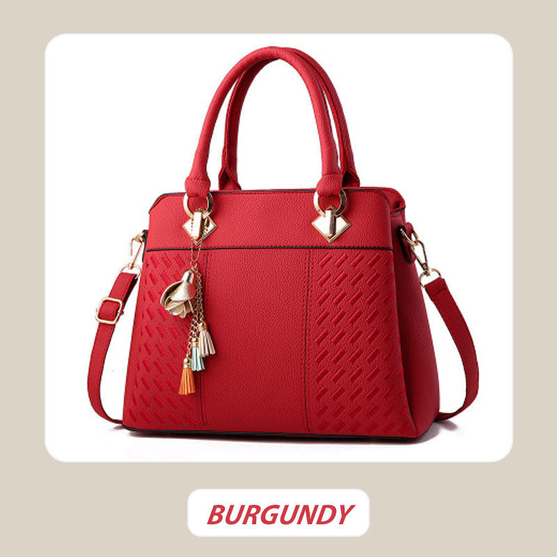 Elegant women's bag with tassel pendant