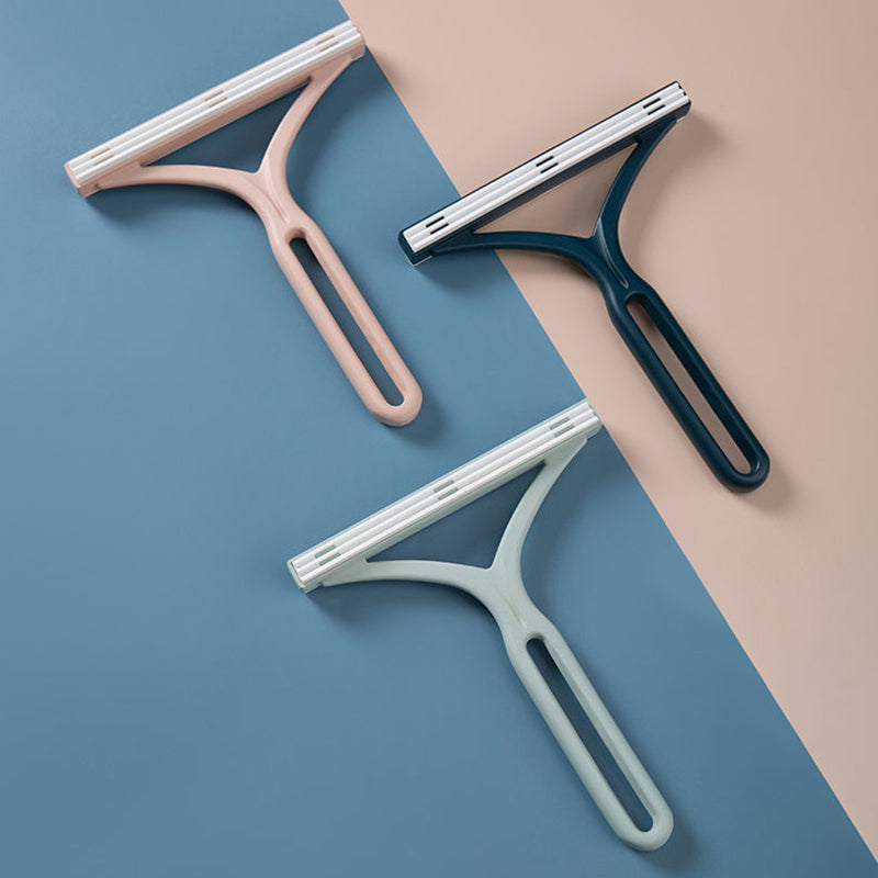 Double-sided manual lint remover