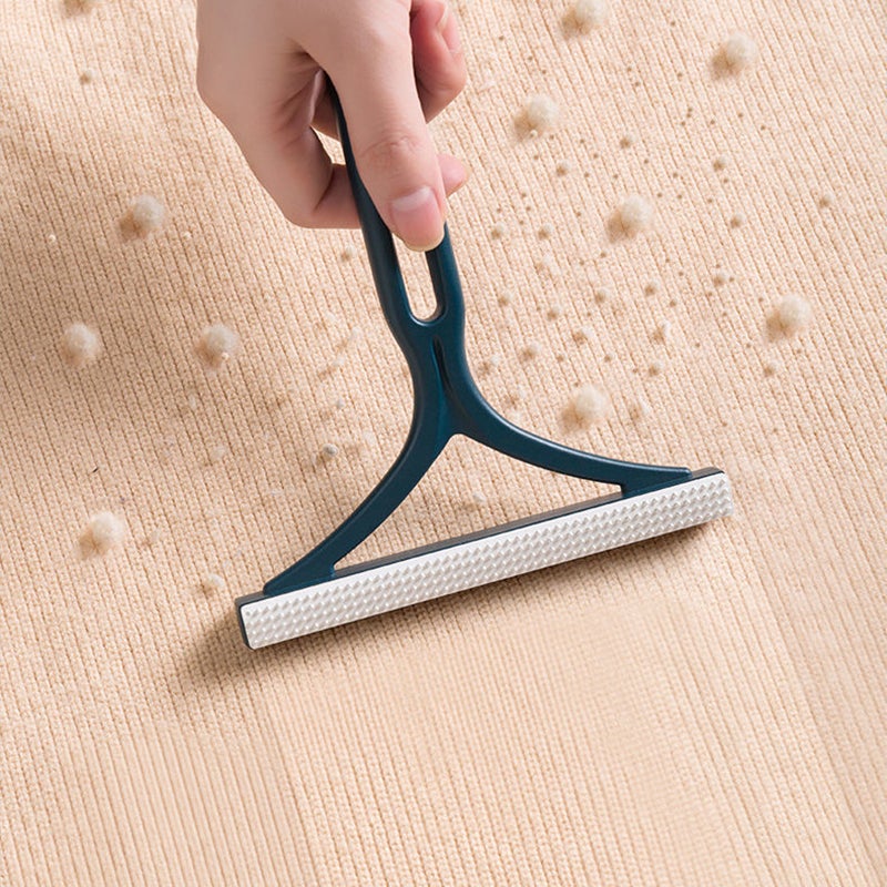 Double-sided manual lint remover