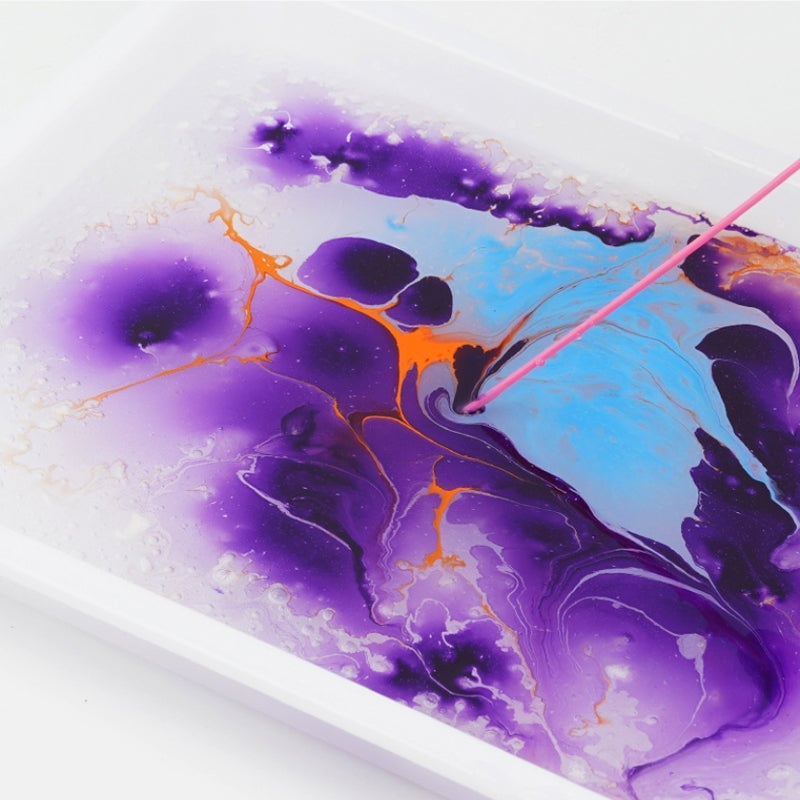 Marbling of watercolor paint for art