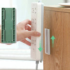 Self-adhesive, punch-free socket holder