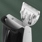 Electric hair clipper with automatic hair suction