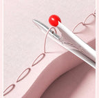 2-in-1 needle threaders and seam rolling tools