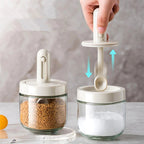 Spice jar with retractable spoon
