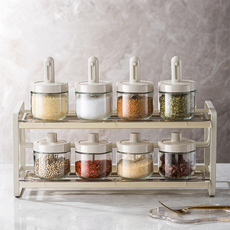 Spice jar with retractable spoon