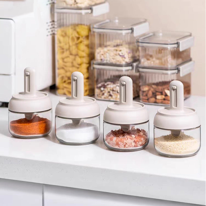 Spice jar with retractable spoon