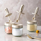 Spice jar with retractable spoon