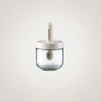 Spice jar with retractable spoon
