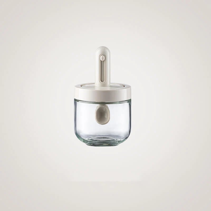 Spice jar with retractable spoon