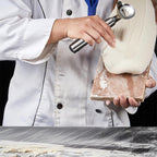 Stainless steel noodle knife with slotted design