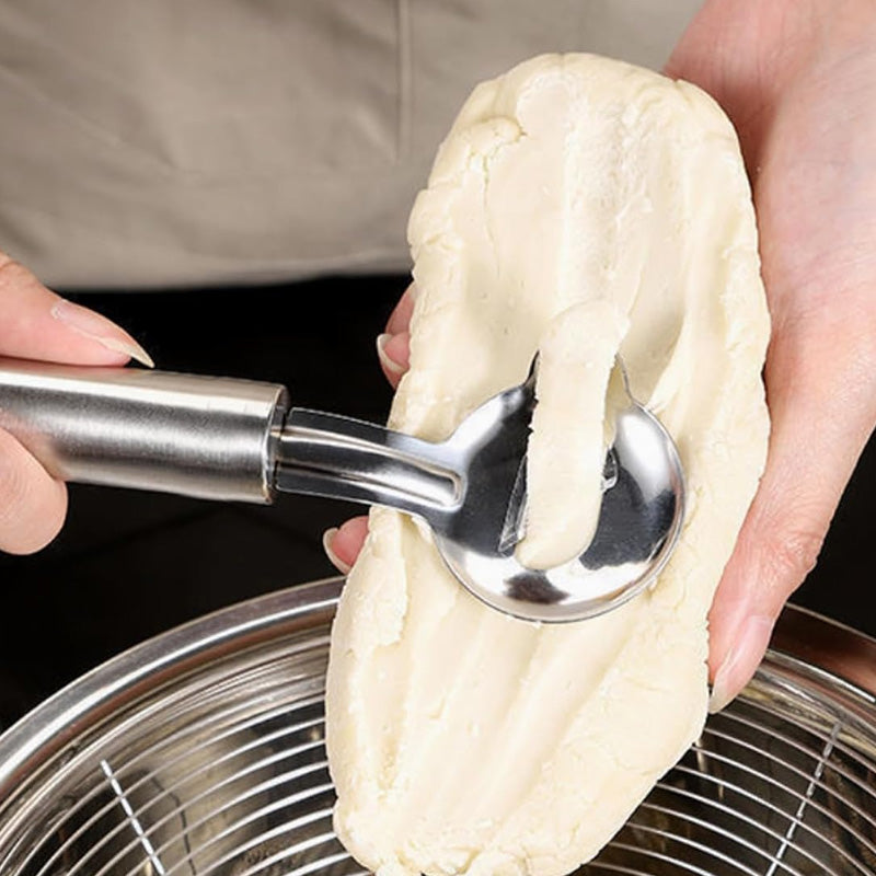 Stainless steel noodle knife with slotted design