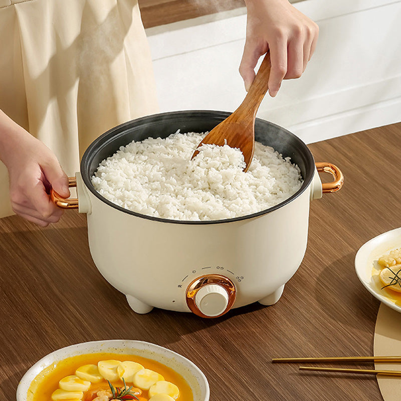 Multifunctional electric non-stick cooker with steamer