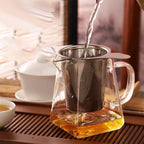 Stainless steel tea filter with double handles and lid